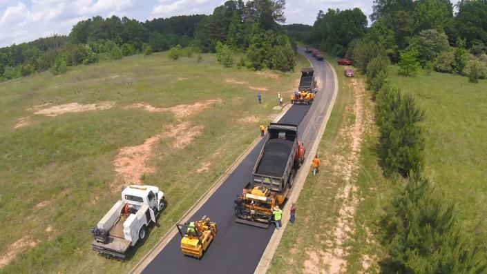 Take a look at our team in progress on this paving job.